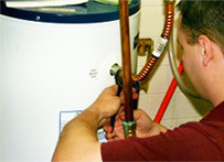 Fremont water heater repair specialist reconnects an intake line